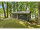 Secluded cabin on a verdant lot, boasting easy access to the water for serene lakeside living at 8434 S Christian Dr, Nineveh, IN 46164
