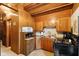 Well-maintained kitchen featuring wooden cabinets and essential appliances, offering a practical cooking space at 8434 S Christian Dr, Nineveh, IN 46164