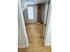 Bright bedroom featuring hardwood floors, exposed brick, and modern finishes at 909 N Temple Ave, Indianapolis, IN 46201