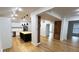 Open kitchen with a large butcher block island and stainless steel appliances is great for entertaining at 909 N Temple Ave, Indianapolis, IN 46201
