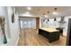 Bright kitchen features a butcher block island, stainless steel appliances, and modern pendant lighting at 909 N Temple Ave, Indianapolis, IN 46201