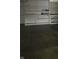 The garage has built-in shelving, offering a great space for storage and organization at 922 Eagle Brook Dr, Shelbyville, IN 46176