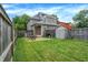 Spacious backyard with patio area and fence providing privacy at 925 Fayette St, Indianapolis, IN 46202