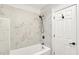 Clean, bright bathroom features stylish tile and shower head at 925 Fayette St, Indianapolis, IN 46202