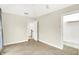 Spacious bedroom with plush carpet, closet, and natural light at 925 Fayette St, Indianapolis, IN 46202