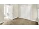 Comfortable carpeted bedroom with closet and natural light from windows at 925 Fayette St, Indianapolis, IN 46202