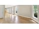 Spacious living room with hardwood floors, neutral paint, and ample windows at 925 Fayette St, Indianapolis, IN 46202