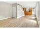 Open-concept living space with hardwood floors, connecting to the kitchen and staircase at 925 Fayette St, Indianapolis, IN 46202
