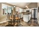 Charming eat-in kitchen with stainless appliances, tile backsplash, and recessed lighting at 9445 Moorings Blvd, Indianapolis, IN 46256
