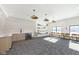 Large amenity space featuring a kitchenette, stylish lighting, and ample seating at 9741 Oleander Dr, Fishers, IN 46250
