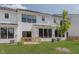 Backyard and wood deck with black trim windows at 9741 Oleander Dr, Fishers, IN 46250