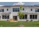 Backyard and wood deck with black trim windows at 9741 Oleander Dr, Fishers, IN 46250