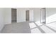 Spacious bedroom features plush carpet, an open closet and an adjacent bathroom at 9741 Oleander Dr, Fishers, IN 46250