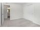 Bedroom with sliding closet and views to an ensuite bathroom at 9741 Oleander Dr, Fishers, IN 46250