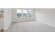 Bright bedroom with three windows and neutral carpeting at 9741 Oleander Dr, Fishers, IN 46250