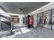A fully-equipped gym featuring treadmills, weight machines, and a punching bag at 9741 Oleander Dr, Fishers, IN 46250