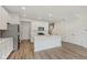 An open concept kitchen with stainless steel appliances, white countertops and recessed lighting at 9741 Oleander Dr, Fishers, IN 46250