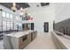 Stylish lounge with a refreshment island, modern appliances, and comfortable seating at 9741 Oleander Dr, Fishers, IN 46250