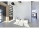 Bright lounge space with modern seating, sleek shelving, and ample natural light at 9741 Oleander Dr, Fishers, IN 46250