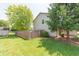 Large backyard with manicured lawn and privacy fence at 977 Canary Creek Dr, Franklin, IN 46131