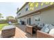 Enjoy the outdoors on the spacious wooden deck featuring comfortable lounge furniture at 977 Canary Creek Dr, Franklin, IN 46131