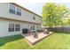 Backyard deck with seating, grill and retractable awning perfect for outdoor enjoyment at 977 Canary Creek Dr, Franklin, IN 46131