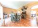 Comfortable dining room with wood floors and stylish decor, bathed in natural light at 977 Canary Creek Dr, Franklin, IN 46131
