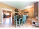 Charming dining space featuring a wooden table and seamless flow to kitchen area at 977 Canary Creek Dr, Franklin, IN 46131