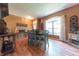 Inviting dining room space filled with natural light and featuring hardwood floors at 977 Canary Creek Dr, Franklin, IN 46131