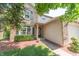 Charming home with brick accents, manicured bushes and landscaping at 977 Canary Creek Dr, Franklin, IN 46131