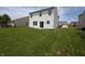 Expansive backyard with lush green grass, offering ample space for outdoor activities and relaxation at 10431 Bellchime Ct, Indianapolis, IN 46235