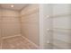 Spacious walk-in closet with wire shelving providing ample storage space at 10431 Bellchime Ct, Indianapolis, IN 46235