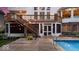 This home features a gorgeous outdoor pool, screened in porch, and deck with lights at 11227 Woods Bay Ln, Indianapolis, IN 46236