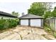 Detached two-car garage with white doors, providing ample parking and storage space at 11309 N County Road 750 W, Elwood, IN 46036