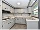Galley style kitchen, gray cabinets with black hardware, with stainless steel sink at 11309 N County Road 750 W, Elwood, IN 46036