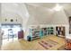 Attic with sloped ceilings, books and plenty of natural light at 1138 N Oxford St, Indianapolis, IN 46201