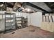 Basement with shelving for storage, a window for natural light, and unfinished walls offering development potential at 1138 N Oxford St, Indianapolis, IN 46201