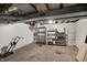 Basement with shelving for storage, a window for natural light, and unfinished walls offering development potential at 1138 N Oxford St, Indianapolis, IN 46201