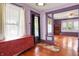 Bright living room showcasing hardwood floors, large windows, and stylish decor, perfect for comfortable living at 1138 N Oxford St, Indianapolis, IN 46201