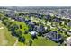 Beautiful neighborhood with large homes and expansive lawns surrounding a central home with a private pool at 11404 Hanbury Manor Blvd, Noblesville, IN 46060