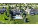 Stunning home with a large backyard featuring a beautiful swimming pool, patio, and well-manicured landscaping at 11404 Hanbury Manor Blvd, Noblesville, IN 46060
