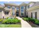 Landscaped front yard with stone and stucco exterior and a walkway to the front door at 11404 Hanbury Manor Blvd, Noblesville, IN 46060