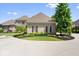 Large garages, driveway, and manicured yard at 11404 Hanbury Manor Blvd, Noblesville, IN 46060