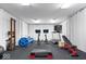 Well-equipped home gym featuring various exercise machines and equipment for a complete workout at 11404 Hanbury Manor Blvd, Noblesville, IN 46060
