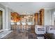 Open-concept kitchen with bar seating, custom cabinets and stainless appliances at 11404 Hanbury Manor Blvd, Noblesville, IN 46060