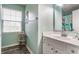 Inviting bathroom with a walk-in shower, ample natural light, and modern fixtures at 11919 Gatwick View Dr, Fishers, IN 46037