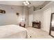 Bedroom boasts neutral walls, carpet, and warm decorative accents, including a fireplace at 11919 Gatwick View Dr, Fishers, IN 46037