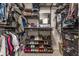 Walk-in closet with ample shelving and hanging space, perfect for organization at 11919 Gatwick View Dr, Fishers, IN 46037