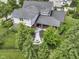 Aerial view of the backyard with a covered patio and firepit area at 11984 Talnuck Cir, Fishers, IN 46037
