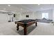 Finished basement featuring a pool table, a lounge area, and a basketball hoop provides entertainment options at 11984 Talnuck Cir, Fishers, IN 46037